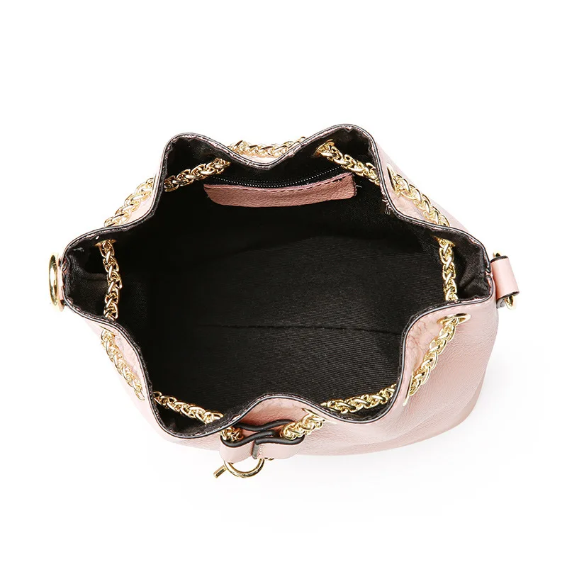 The small and exquisite women messenger bags add color to the romantic and elegant life. The new trend cowhide bucket bag
