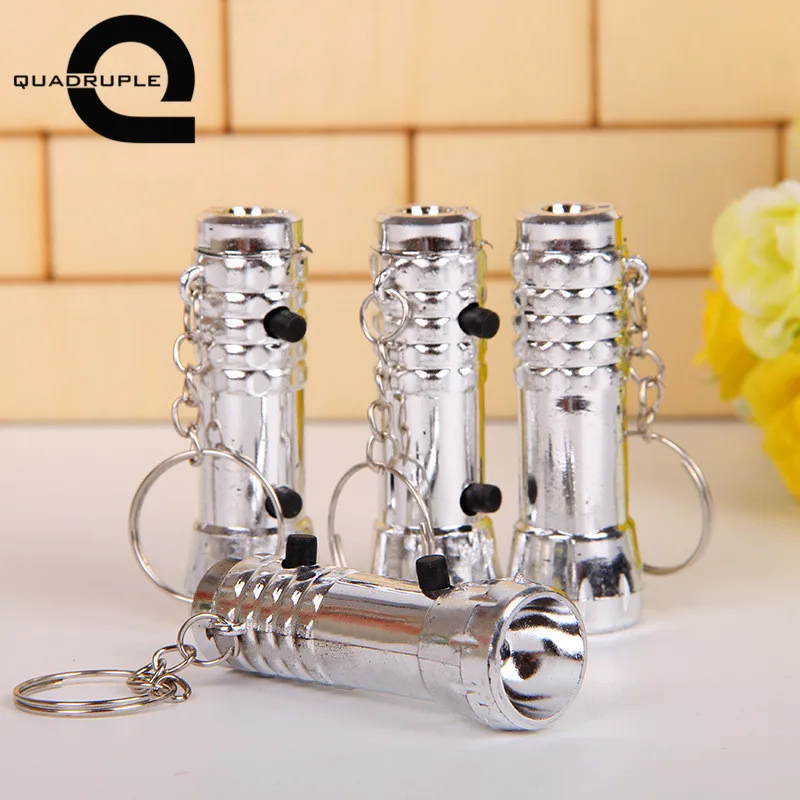 

Quadruple 1pc Vintage Mini Portable LED Flashlight Torch Lamp Keychain Handheld Camping Keychain Light Pendant Accessories