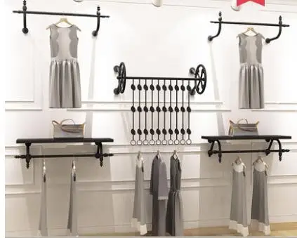 Clothes store display rack wall men's and women's wear vintage shelves children's wear wall hanging clothes rack rack display .