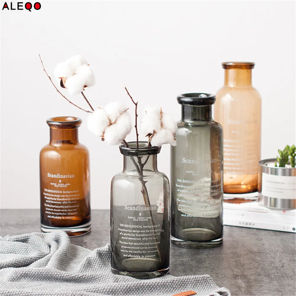 https://ae01.alicdn.com/kf/HTB1P_TLaRsmBKNjSZFFq6AT9VXa7/Scandinavian-Nordic-Chic-European-Glass-Gray-Storage-Jar-Bottle-Minimalist-Desk-Storage-Bottle-Organizer-Flower-Container.jpg