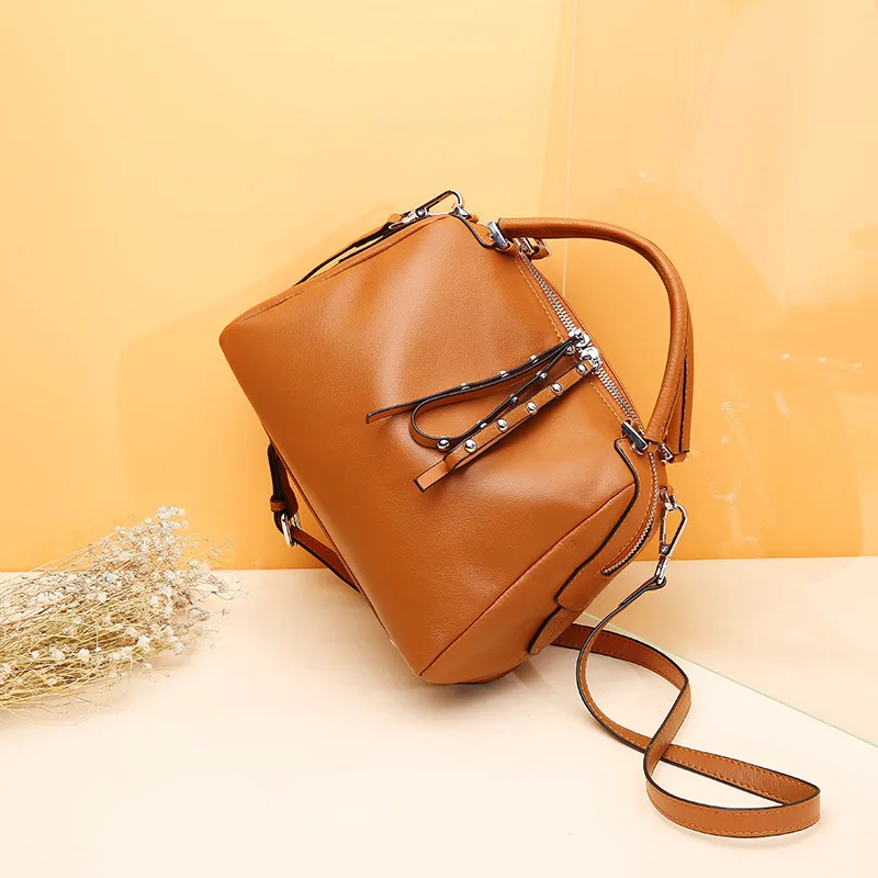 Fashion Luxury and noble leather designer women handbags high quality beautiful rivet decoration tassels women messenger bags