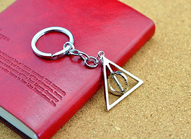 

Wholesale 20pcs/lot Movie Jewelry HP Keychain Deathly Hallows Keychain Rotated Triangle Key Chain For Women&Men