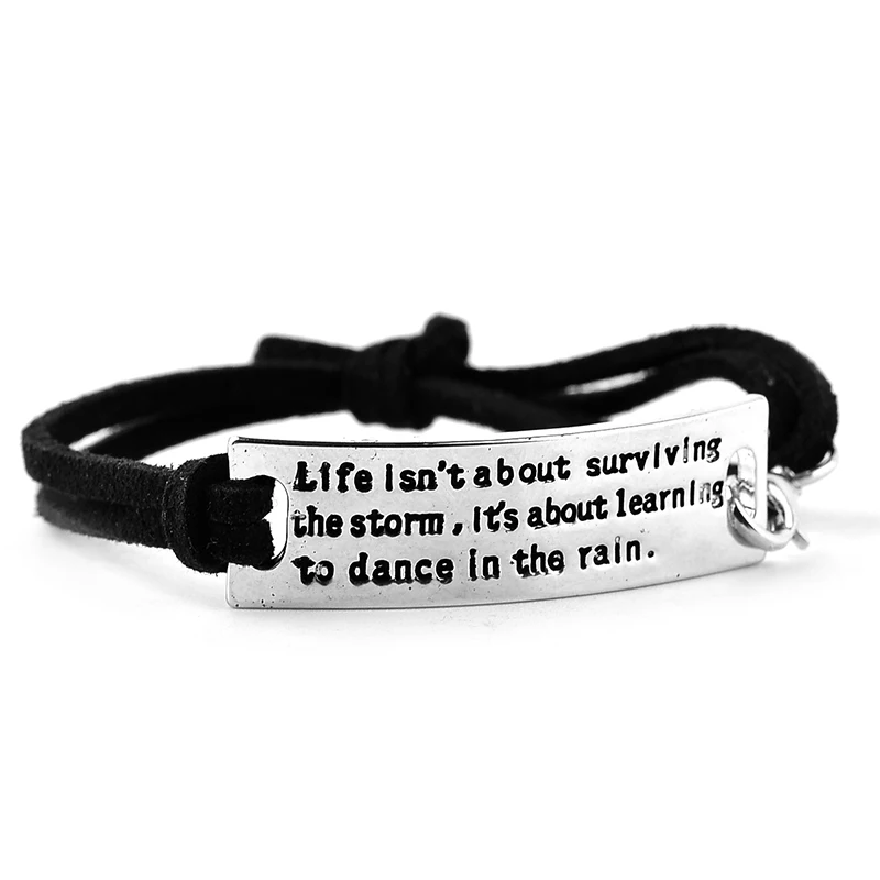 

Silver Plated "Life isn't about surviving the storm, it's about learning to dance in the rain" Inspirational leather bracelet