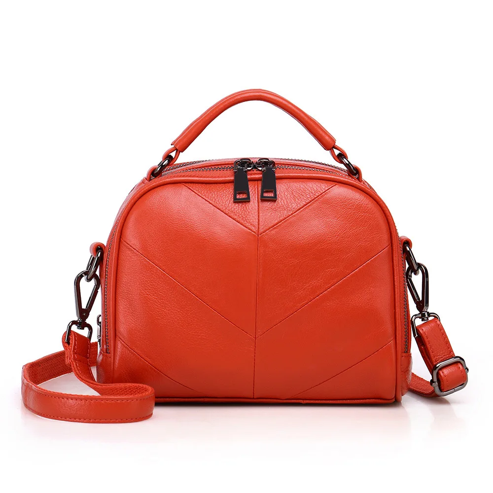 

Women's new leather oval stitching handbag Korean version of the first layer leather billet shoulder small square bag