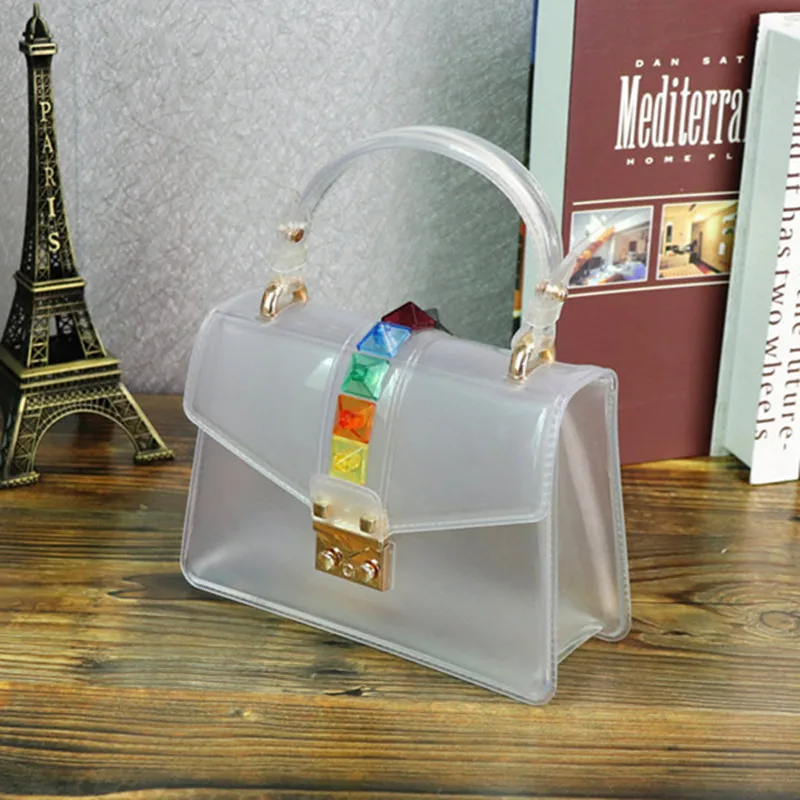 Прозрачная брендовая мини Желейная сумка с заклепками, ПВХ Сумочка, твердая конфетная женская сумка на плечо, Маленькая седельная сумка через плечо