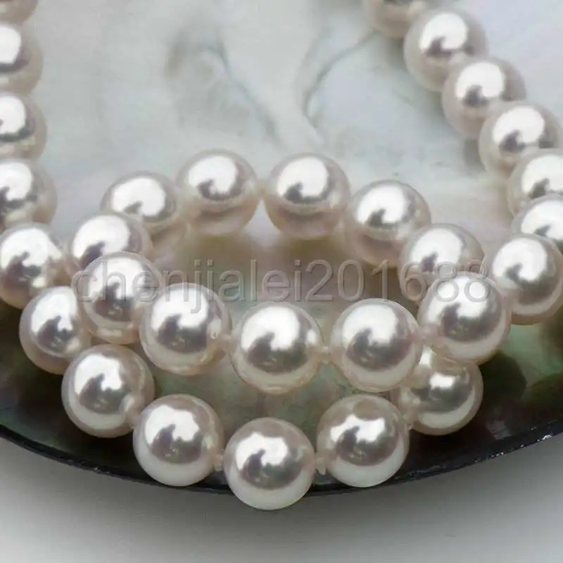 

10-11mm SOUTH SEA ROUND WHITE PEARL NECKLACE 18''