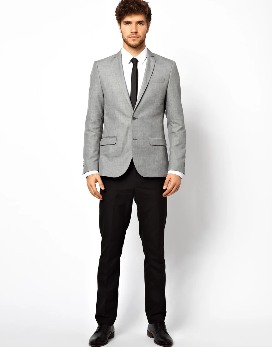 Men’s Grey Blazer Light Grey Blazer. While many blazers can appear heavy when worn in warm weather, soft grey styles look bright and breezy. As such, a light grey blazer is a perfect option for functions throughout summer and spring.