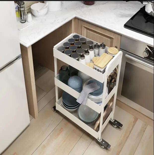  A three-story trolley is fitted with a rack of kitchen supplies and a rack of kitchen utensils. - 32850967801