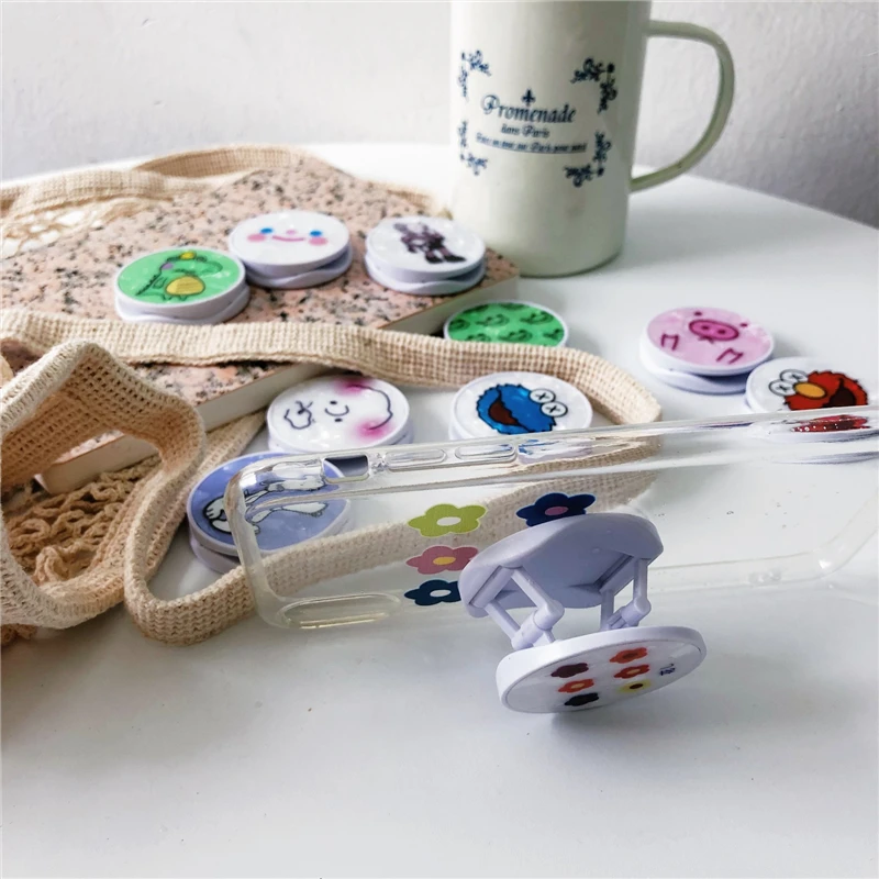

TJHSZKL Cute cartoon pig smiley pattern round universal telescopic bracket and grip ring bracket mobile phone folding bracket