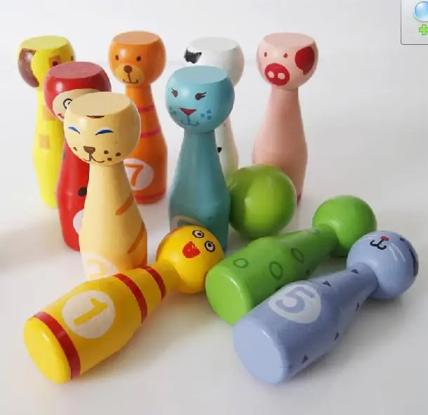 

Free shipping Kids Wooden Bowling Children toys Cartoon Animals Wood Puppet Early Training Development Movement Challenging Game