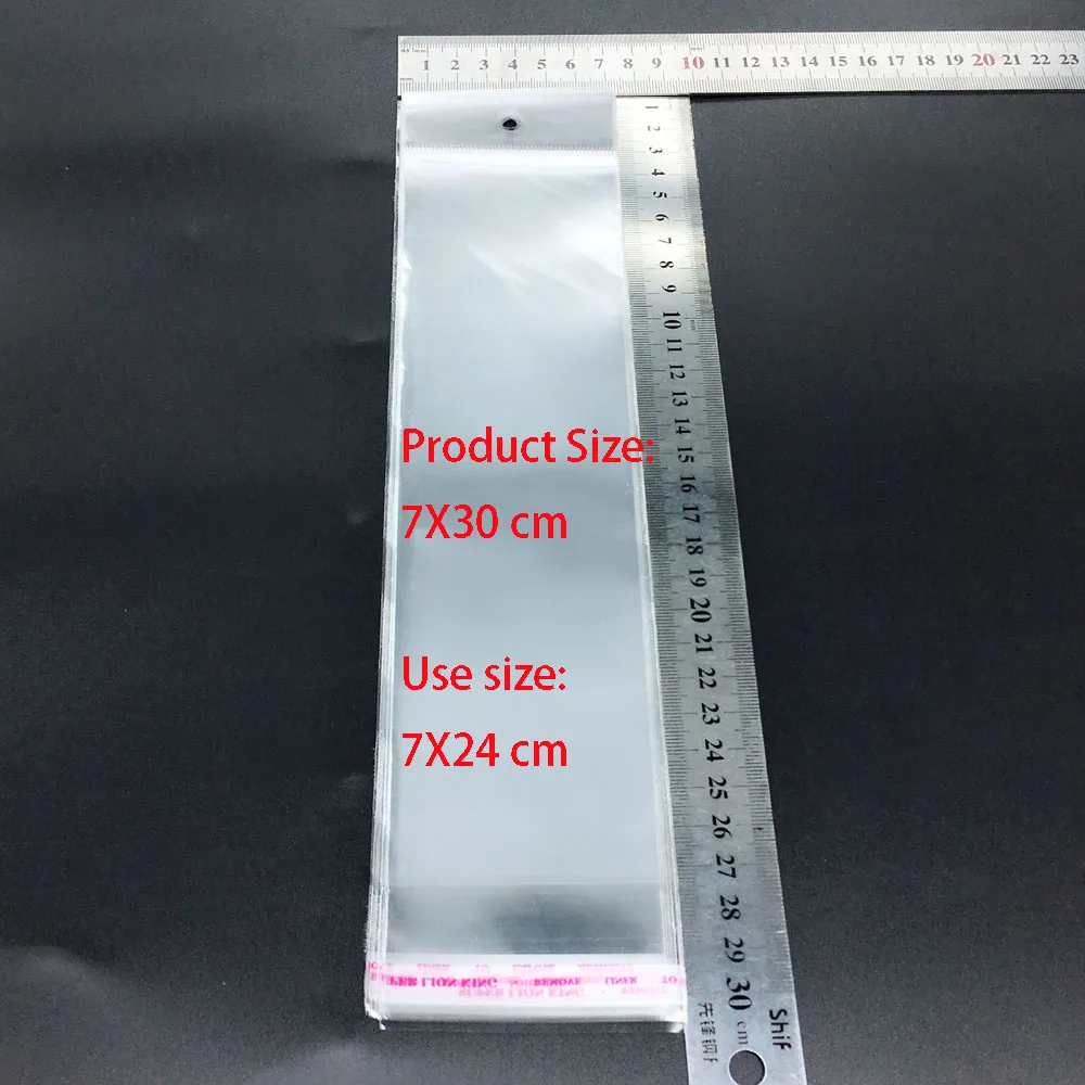 

50Pcs/ Lot Clear Self Adhesive Seal Plastic Bag Pouch Party OPP Packing Storage Bags Hang Hole 7x30cm