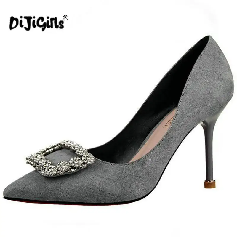pointed buckle heels