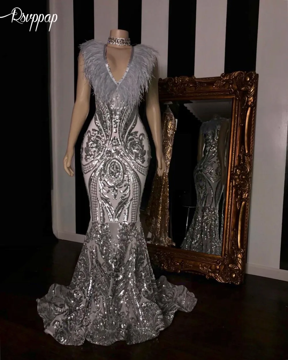 black and silver sequin prom dress
