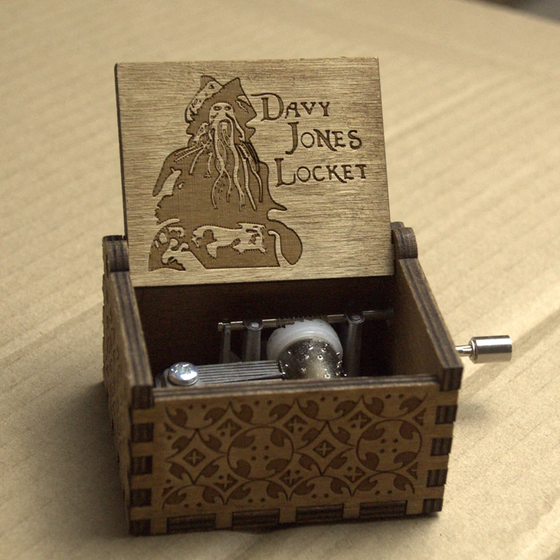 

Gifts Moive Pirates of the Caribbean Davy jones Locket Theme Handmade Engraved Wooden Music Box Crafts Cosplay