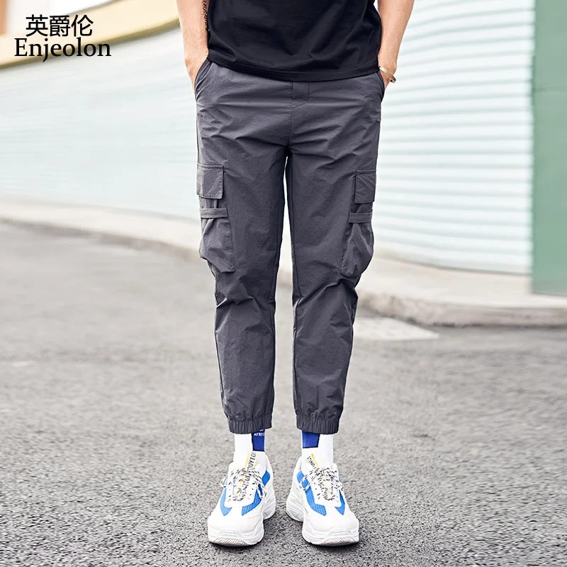 

Enjeolon Brand Cargo Pants Men Solid Color Black Loose Casual Jogger Pocket Elastic waist Ankle Length Trousers New ArrivalK6630