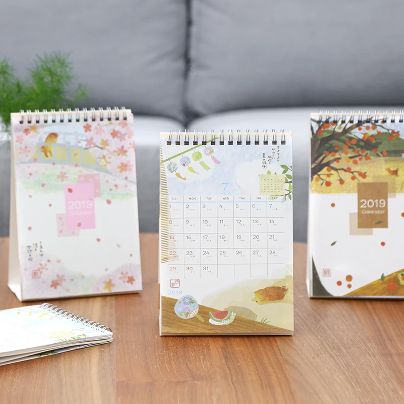 

2019 Year Cute landscape Creative Desk Standing Paper Multifunction Organizer Schedule Planner NoteBook New Cartoon Calendar