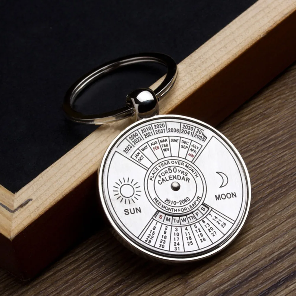 

Mini Perpetual Calendar Keychain Unique Metal Keyring Sun Moon Carving 2010 to 2060 Calendar Key Ring Creative Gifts hot sale