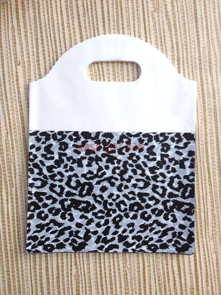 Us 17 1 10 Off 100pcs Lot 25 29 5cm Black Leopard Print Plastic Bag Recyclable Packaging Bags Hand Ping Portable Boutique Gift In