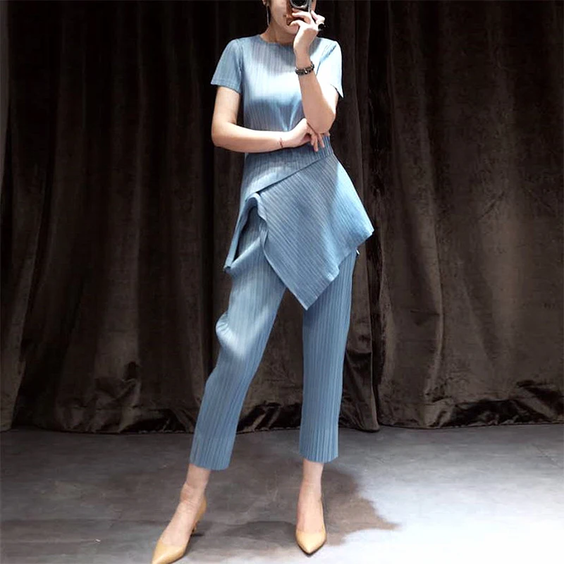 Vouwen Set Korte Mouw 2019 Nieuwe Xia Yu Jie Qi Daling Broek Mode temperament Twee sets van Europese vrouwen Vouwen Set Korte Mouw 2019 Nieuwe Xia Yu Jie Qi Daling Broek Mode temperament Twee sets van Europese vrouwen