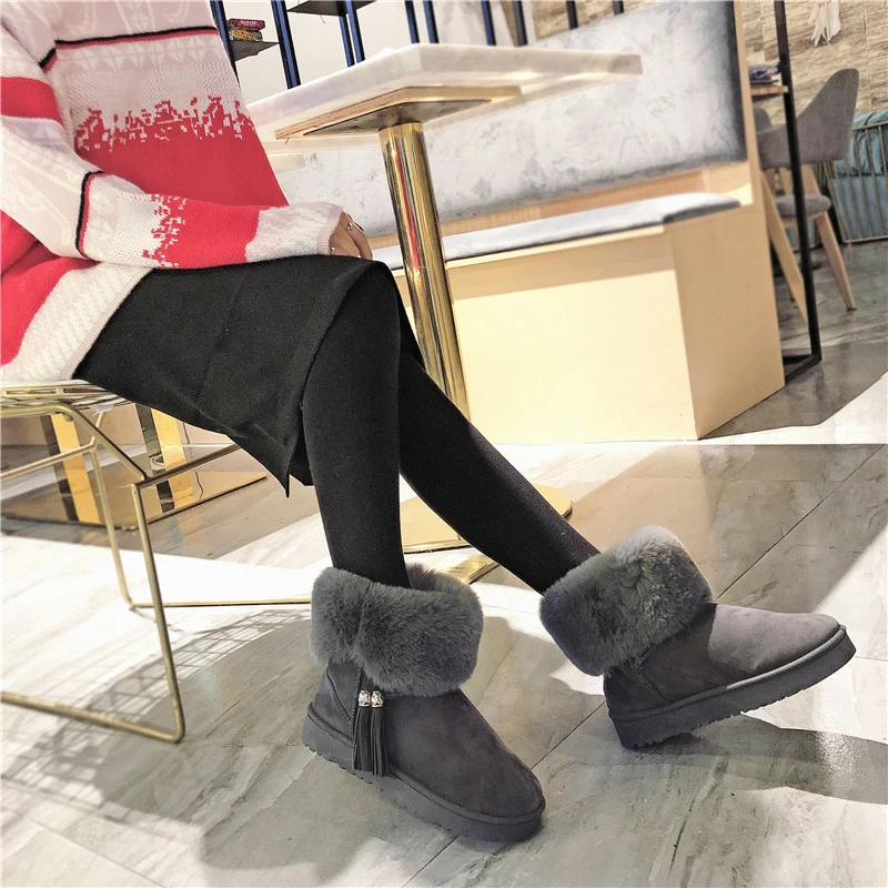 

2018 new thick bottom new snow boots female short tube Korean version of warm and velvet wild student boots.