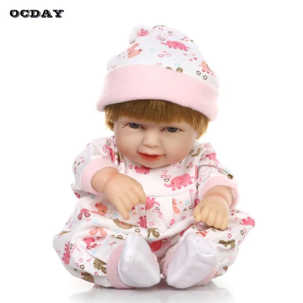 27 см улыбка реалистичные ребенка Bebe девушка кукла реборн с спальный мешок игрушки для девочек мягкий силиконовый очаровательны Куклы