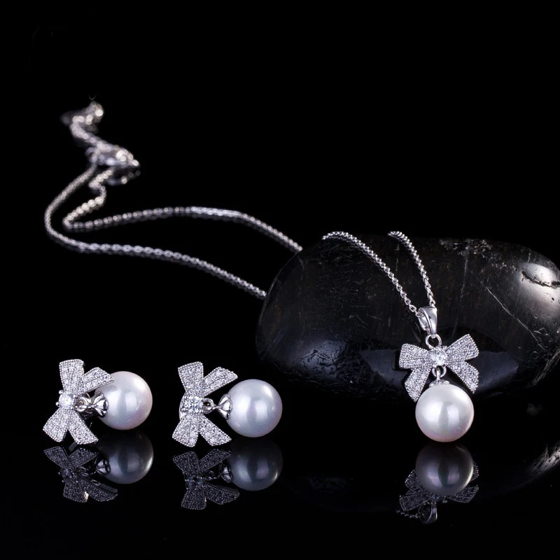 Лучший подарок белый кубический цирконий лук с серьги с крупным жемчугом и кулон ожерелье AAA+ белый CZ комплекты украшений для женщин