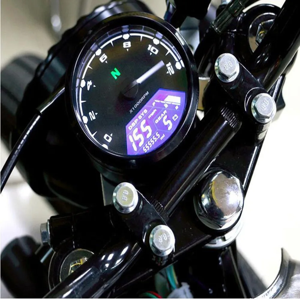 

Universal Digital Motorcycle Speedometer Odometer Techometer Gauge Dual Speed LCD Screen for 1-4 Cylinders