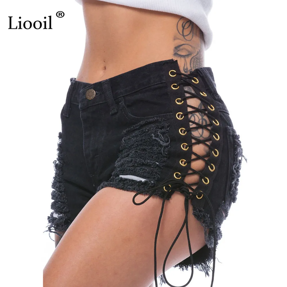 Liooil размера плюс с кисточками джинсовые вечерние Rave шорты женские сексуальные Клубные обтягивающие со средней посадкой рваные с заклепками и пуговицами черные короткие джинсы