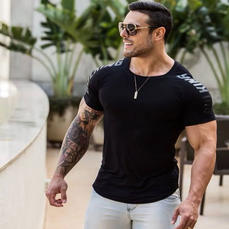 2018 الصيف جديد رجل الجمنازيوم T قميص نجوم النادي الأهلي اللياقة البدنية كمال الاجسام الأزياء الذكور قصيرة القطن ماركة الملابس المحملة قمم