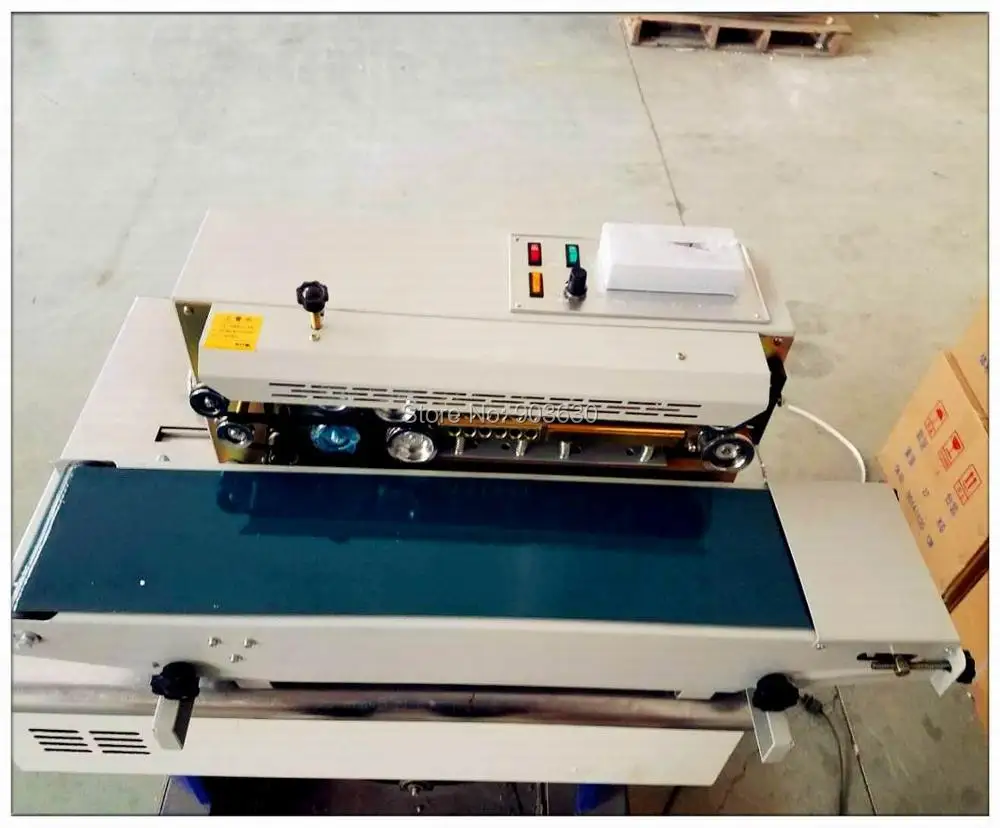 High quanlity FR 900 continuous plastic bag sealing machine,automatic