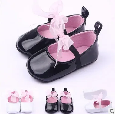2015 년 카와이 아기 신발 첫 번째 워커 스 공주 싱글 나비 여자 테니스 신발 매듭 아동 모카신 무료 배송