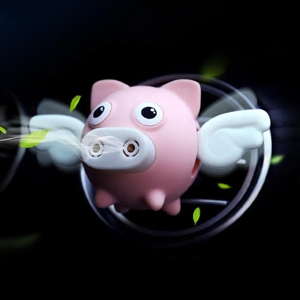 

Cartoon Flying Pig Car Air Outlet Freshener Perfume Aroma Clip Diffuser Decor