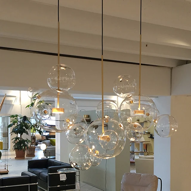https://ae01.alicdn.com/kf/HTB1PqP6cWmgSKJjSsphq6Ay1VXaO/Nordic-post-moderne-glazen-hanglamp-eenvoudige-mode-originaliteit-receptie-woonkamer-restaurant-lamp-designer-art-lamp.jpg_640x640.jpg