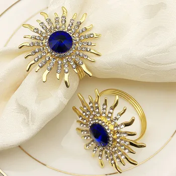 

Elegant Shiny Gold Plating With Blue Clear Stones Jeweled Sunflower Design Zinc Alloy Circle Napkin Rings Set of 12 Pieces