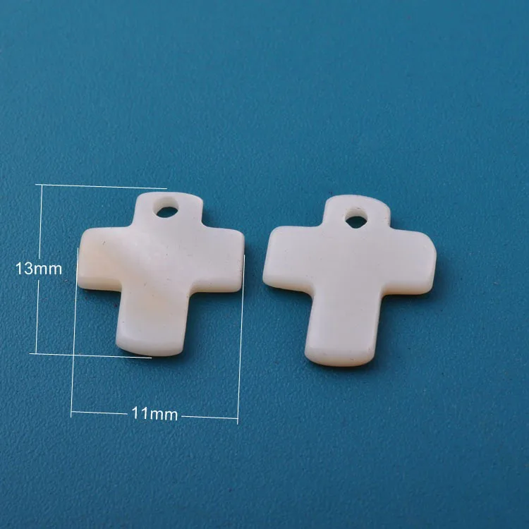 

Wholesale 2000 pieces 11*13mm Natural Pearl Shell Cross Beads with Hole