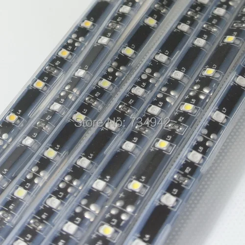 

Whole Injection IP68 Five Meter DC 12V SMD3528 Flexible LED Strips with 300 LEDs 8mm Width PCB, Black Background