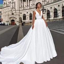 Eightree Satin A Line Wedding Dresses Illusion V-neck Simple Crystal Belt Ball Gown Chapel Train Bridal Gowns Vestido de noiva Eightree Satin A Line Wedding Dresses Illusion V-neck Simple Crystal Belt Ball Gown Chapel Train Bridal Gowns Vestido de noiva