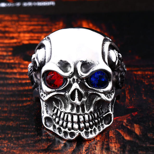 STAINLESS STEEL SKUL RING WITH RED BLUE EYE