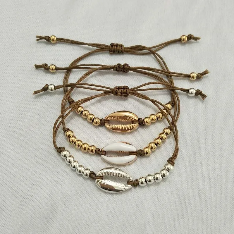 Женский браслет из ракушек Cowrie золотого и серебряного цвета с бусинами нежный