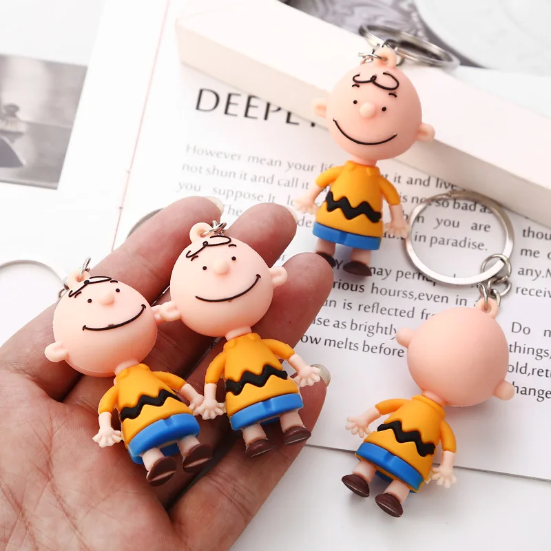 

Fashion INS Cute Cartoon Charlie Brown Key Chain For Ladies Creative Car Bag Charms Accessories Anime Keychain Boyfriend Gifts