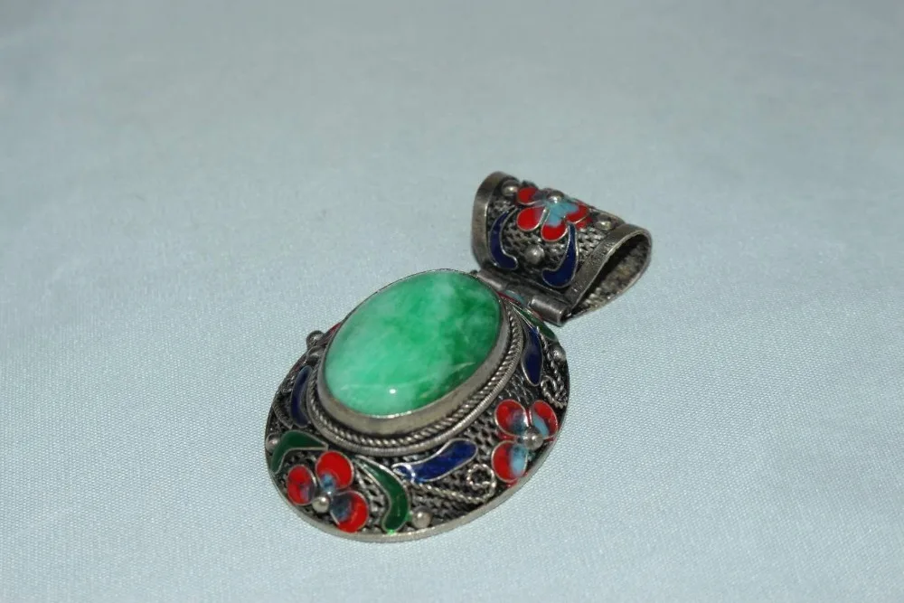 

Tibet and Nepal folk Cloisonne inlaid with Turquoise jade Pendant