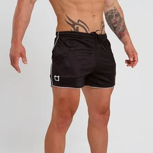 Мужские летние новые фитнес-шорты для тренировок, мужские Модные компрессионные быстросохнущие Спортзалы, бодибилдинг шорты для бега спортивные брюки прилегающего кроя