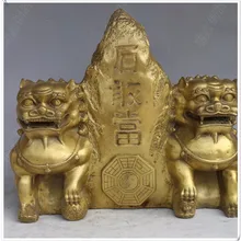 Латунные собаки фу, сидящие рядом с Shigandang горой фэн шуй