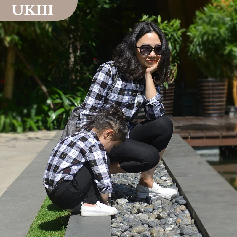 mom and daughter matching plaid shirts