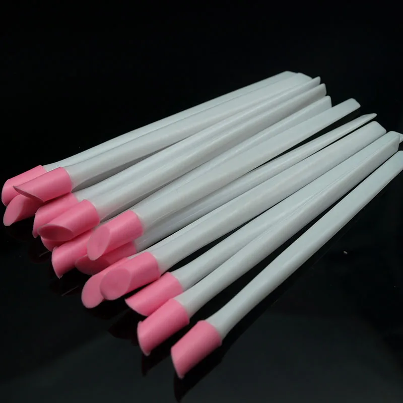 

10pcs/lot,promotional White with Pink soft head. Polish pushers nail cuticle pushers,Manicure necessary pusher! free shipping