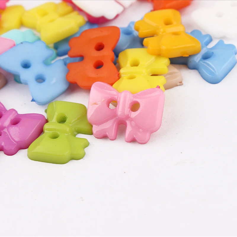 

100pcs 2 HolesMixed color Butterflyplastic button baby sewing button decoration / sewing / craft / scrapbook accessories 14*10mm