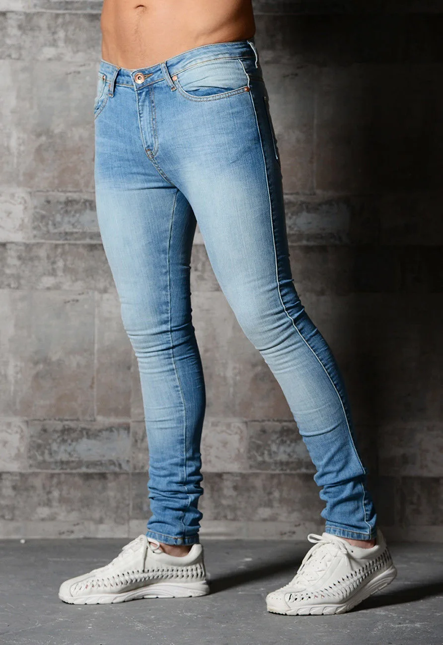 tight fitting blue jeans