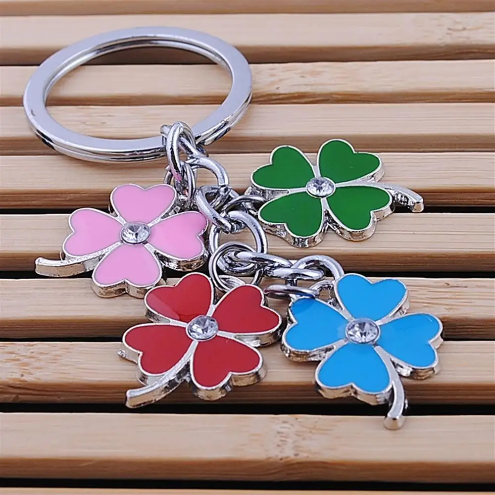 

2019 Hot Stainless High Quality Green Leaf Keychain Fashion Creative Beautiful Four Leaf Clover Steel Lucky Key Chain Jewelry