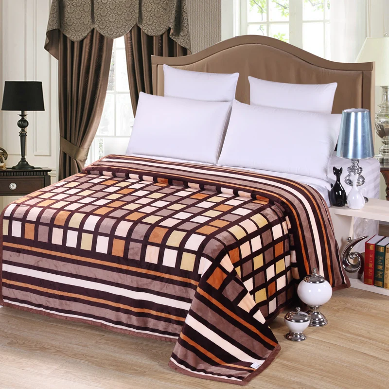 Plaid bedding 100 polyester fleece blanket on the bed,100 polyester