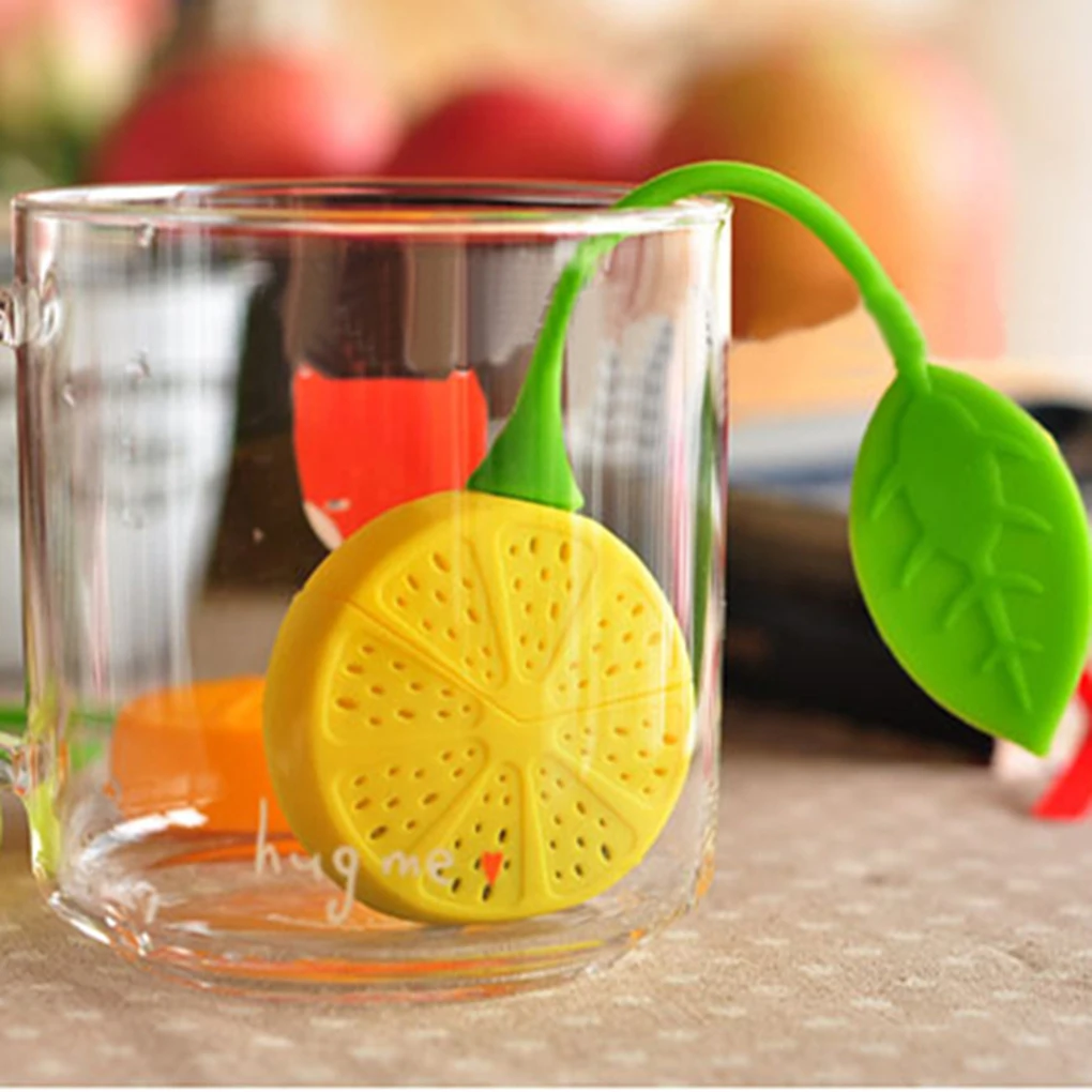 

Hot Sales Tea strainer Lemon Shaped Silicone Perforated Tea strainer Filter Infuser Orange Green